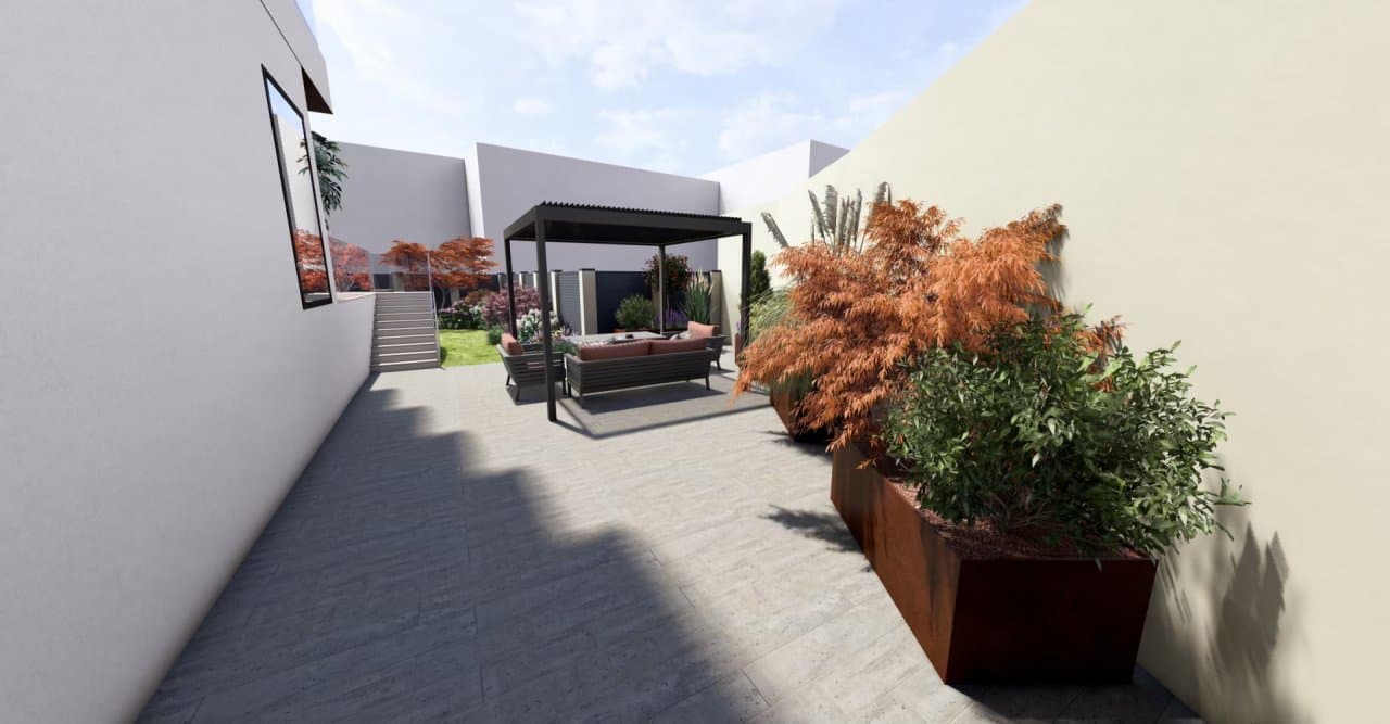 Curte laterală cu pavaj și plante ornamentale