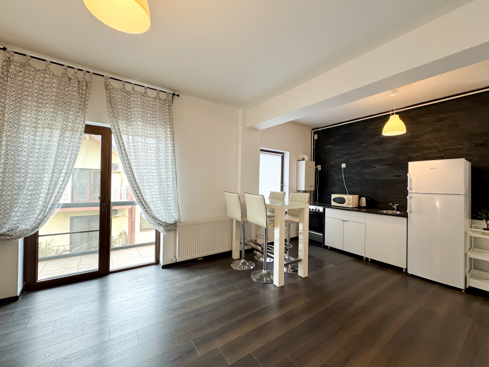 Salajan. Garsoniera mobilata, utilata si cu loc de parcare.